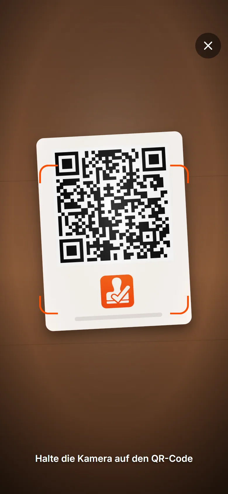 Kunden-App, Scanner: die Kamera zeigt einen QR-Aufsteller auf dem Tresen.